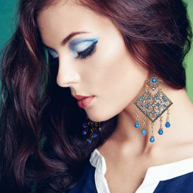 portrait-of-beautiful-brunette-woman-with-earring-PWLMLBH.jpg