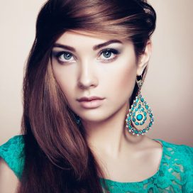 portrait-of-beautiful-young-woman-with-earring-PAJ3QFJ.jpg